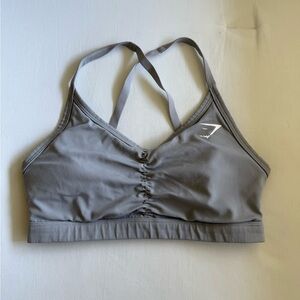 Gymshark Gray Sports Bra with Crossed Straps and Ruched Front